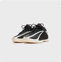 Adidas Black Sneakers with Sculpted Cream Soles and Red Accents