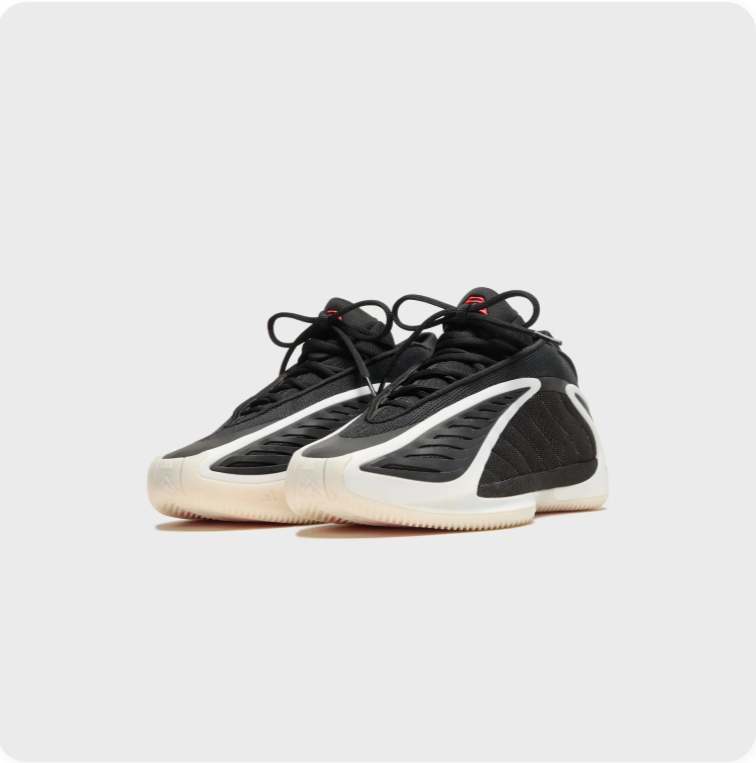 Adidas Black Sneakers with Sculpted Cream Soles and Red Accents