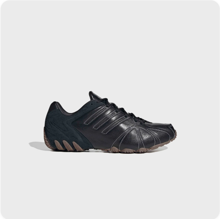 Adidas Black Contrast-Stitch Low-Top Sneakers with Segmented Soles