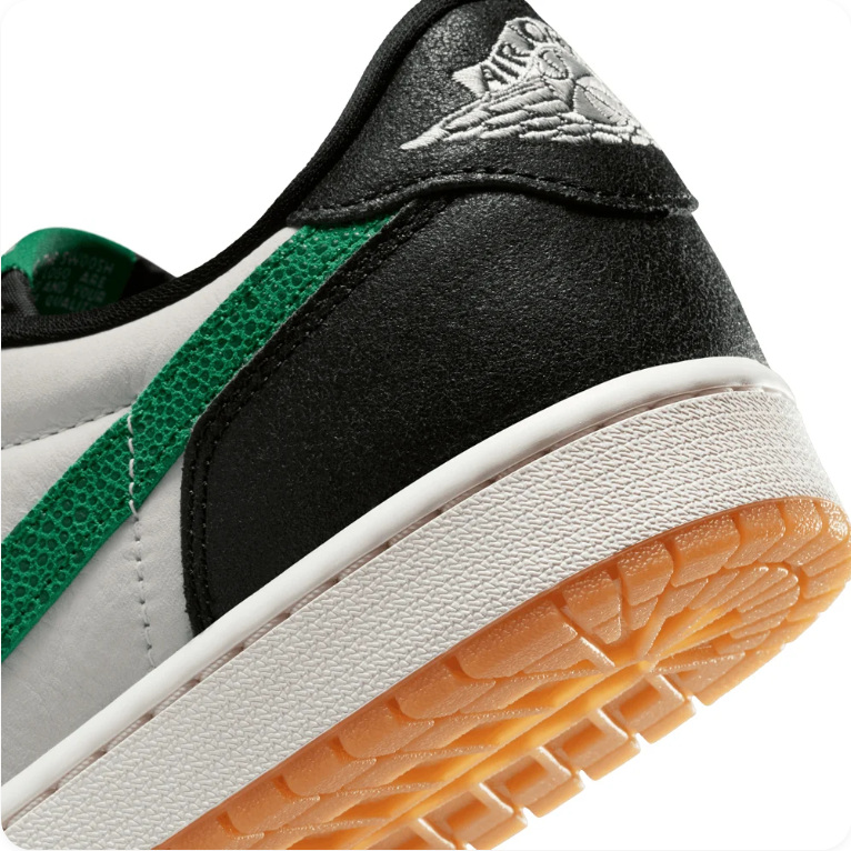 Air Jordan 1 Black and White Low-Top Sneakers with Green Accents and Tan Soles