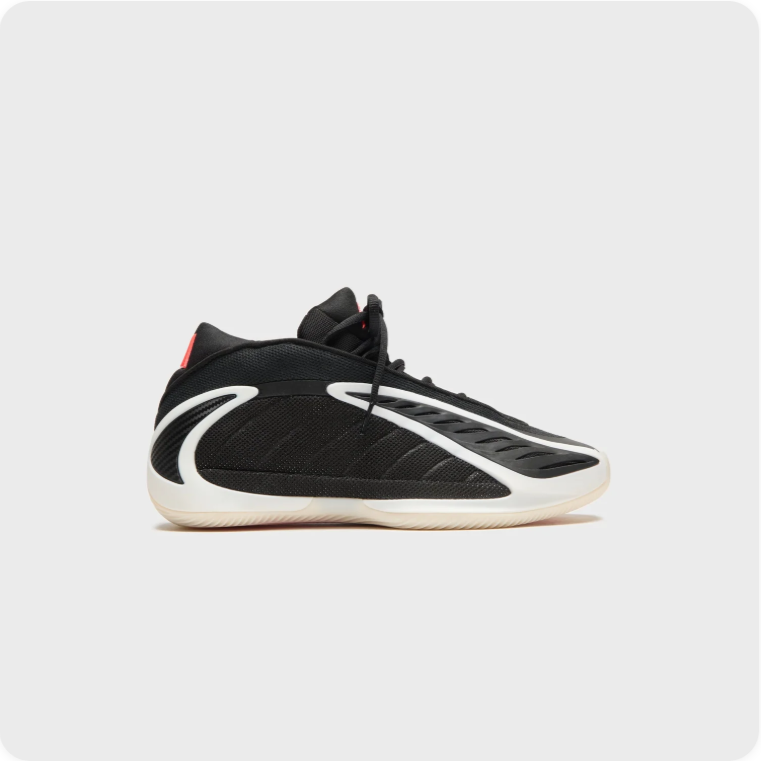 Adidas Black Sneakers with Sculpted Cream Soles and Red Accents