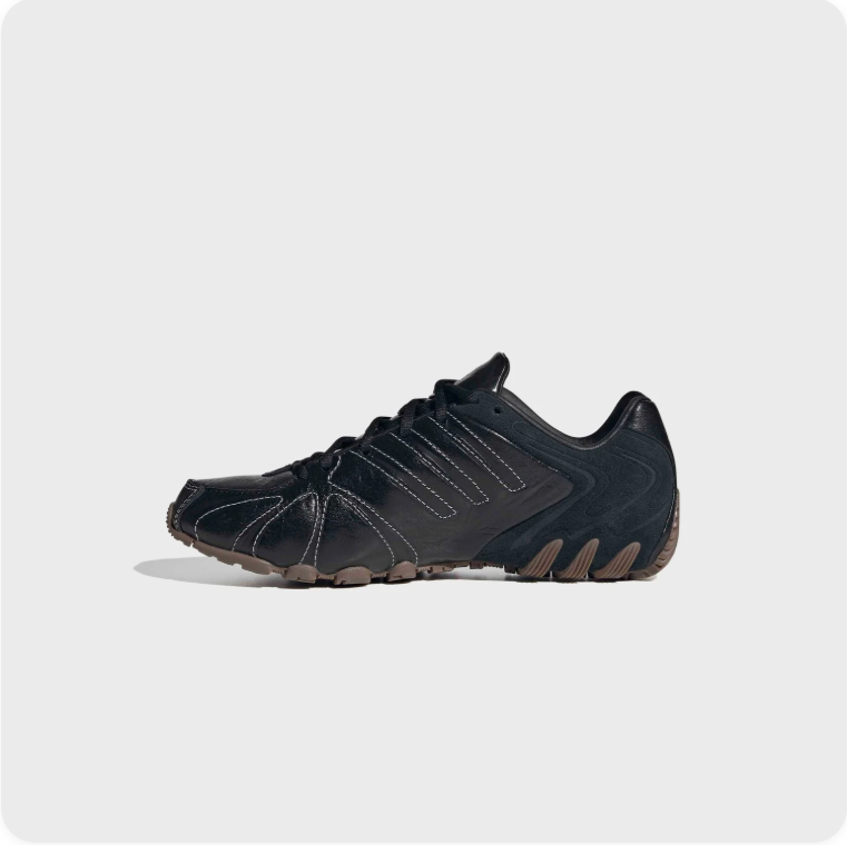 Adidas Black Contrast-Stitch Low-Top Sneakers with Segmented Soles