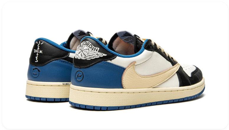 Air Jordan 1 Black, White and Blue Low-Top Sneakers with Cream Reverse Swoosh