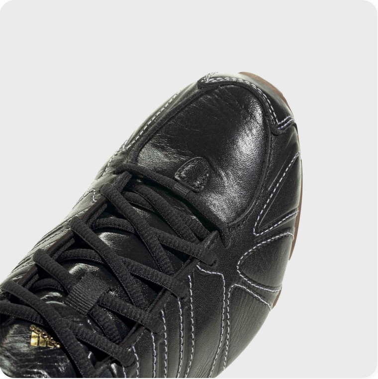 Adidas Black Contrast-Stitch Low-Top Sneakers with Segmented Soles