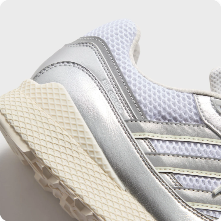 Adidas Metallic Silver Low-Top Sneakers with Chunky Cream Soles
